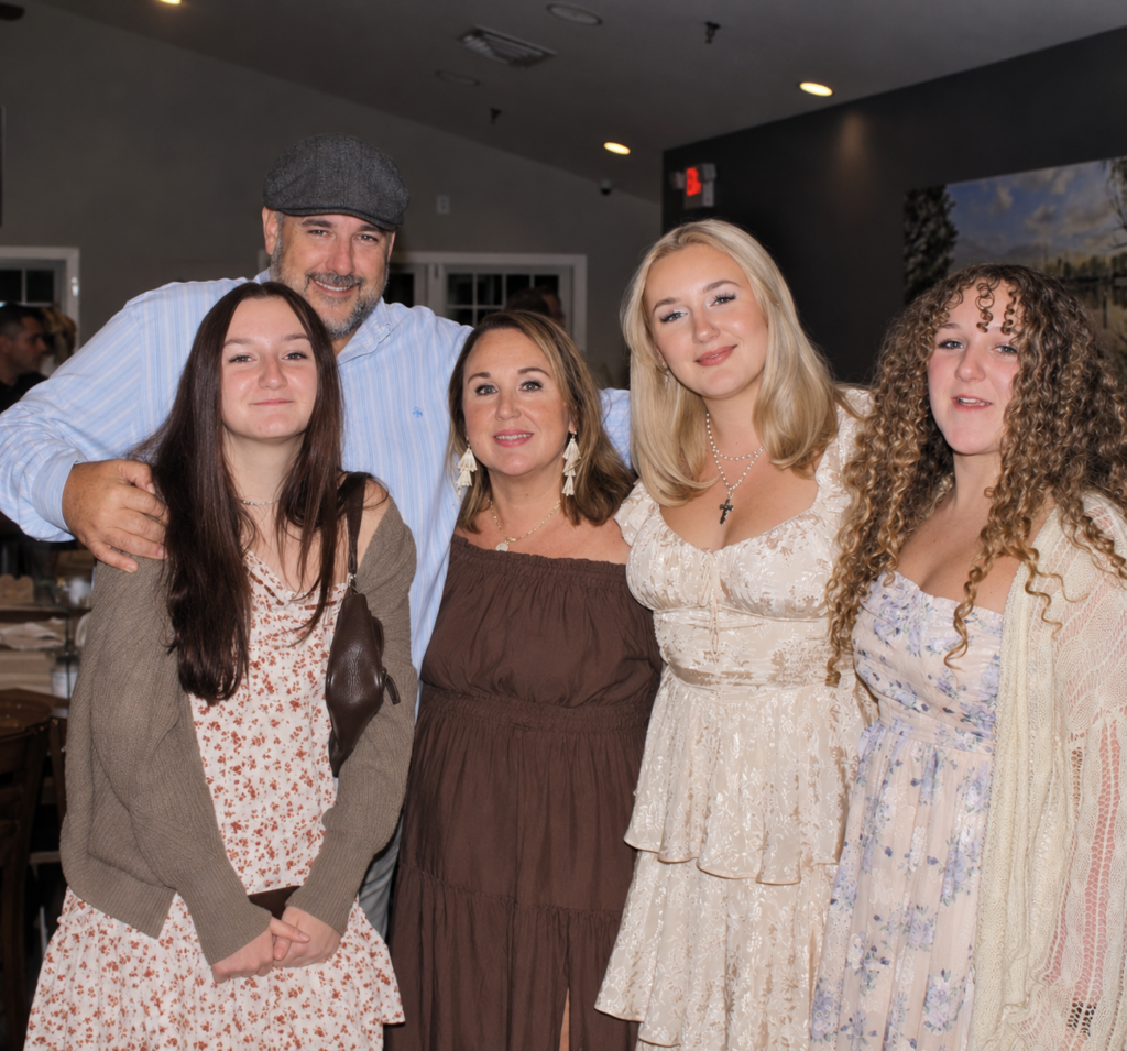 Brian Mayer with his wife Valerie and their three daughters